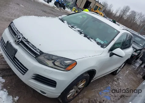 2012 Volkswagen Touareg Vr6 Sport z USA, uszkodzony, nr VIN WVGEF9BP1CD006725